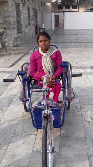 Distributed wheels chairs to Poor people