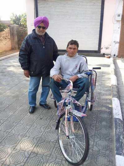 Distributed wheels chairs to Poor people