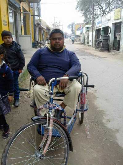 Distributed wheels chairs to Poor people