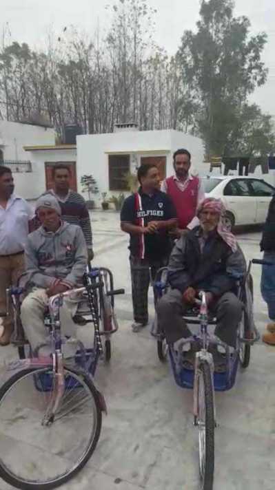 Distributed wheels chairs to Poor people