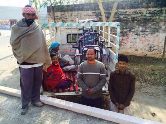 Distributed wheels chairs to Poor people