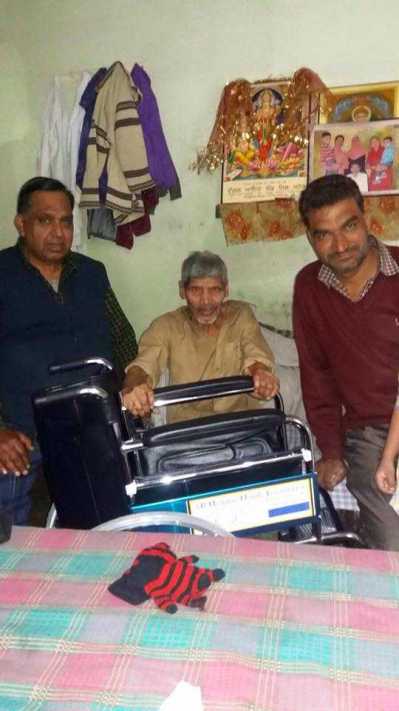 Distributed wheels chairs to Poor people