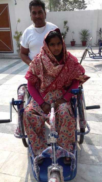 Distributed wheels chairs to Poor people